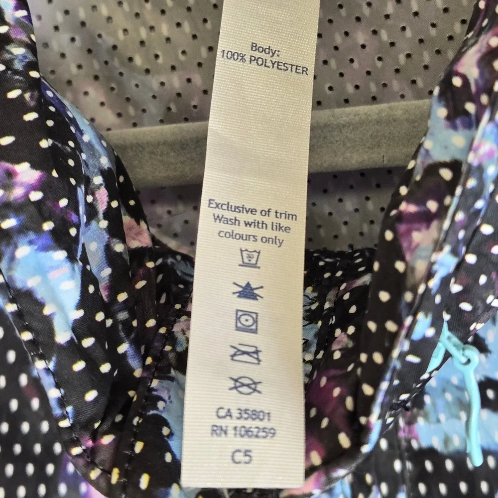 Lululemon Pack It Vest Floral Sport Tranquil Blue Multi Stow Away Hood Size 8